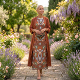 Daniela - Long floral patterned dress with a fitted vest
