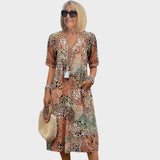 Leontýna – Printed midi dress with a V-neck