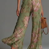 Amelia – green pleated floral jumpsuit
