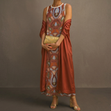 Daniela - Long floral patterned dress with a fitted vest